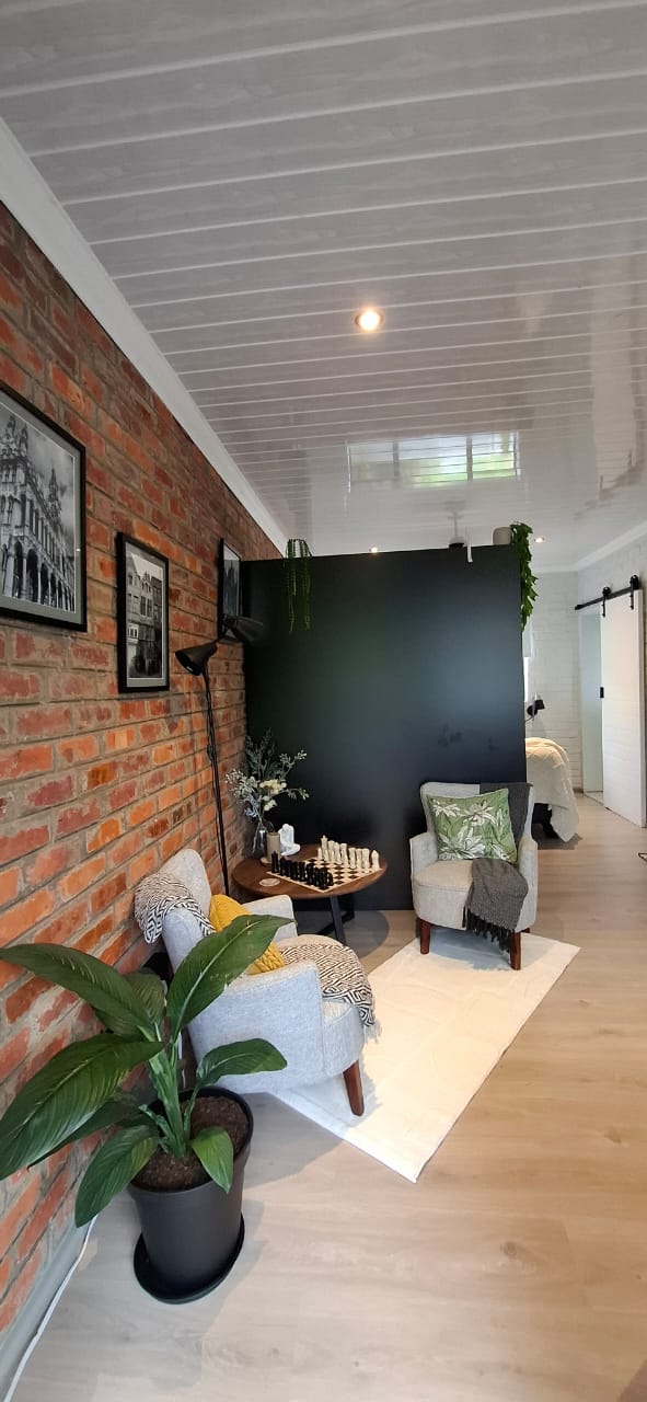 Portrait view of the living area with seating